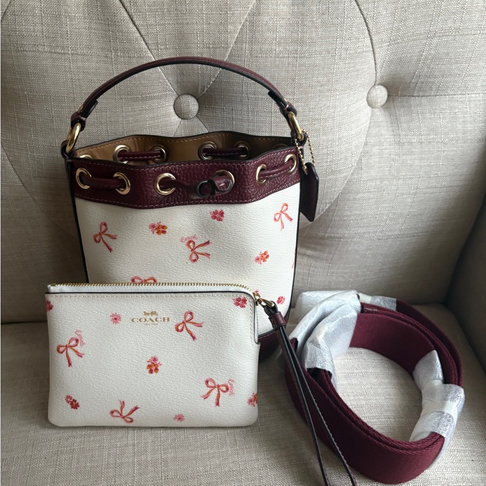Coach Dempsey Drawstring Bucket Bag 15 With Bow Print In Chalk Wine & wristlet - Picture 1 of 6